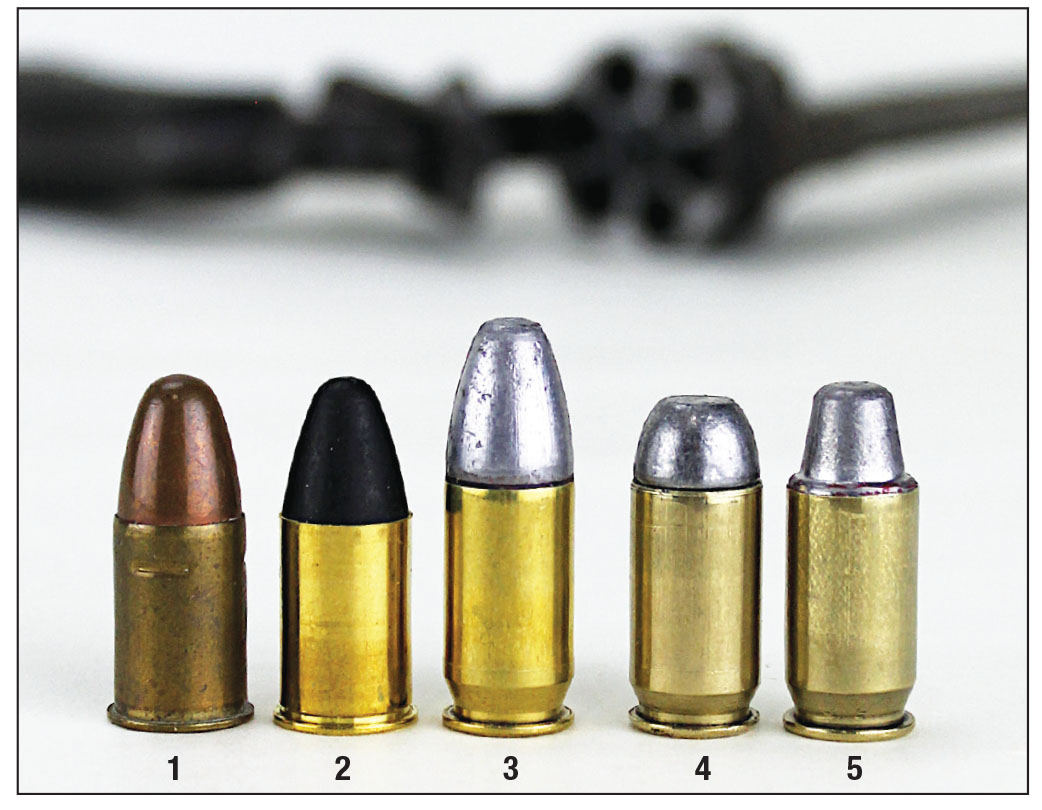 An original (1) 455 Webley MKIV cartridge and (2) a modern Fiocchi 455 Webley cartridge followed by three 45 ACP cases loaded with (3) a .455-inch, 260-grain hollowbase bullet, (4) a 250-grain RNFP bullet and (5) a 200-grain LSWC bullet.